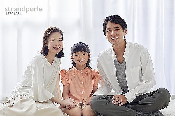 Glückliche japanische Familie