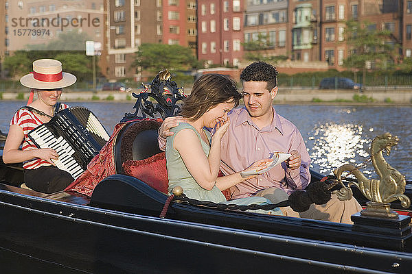 Mid adult couple romancing in a gondola