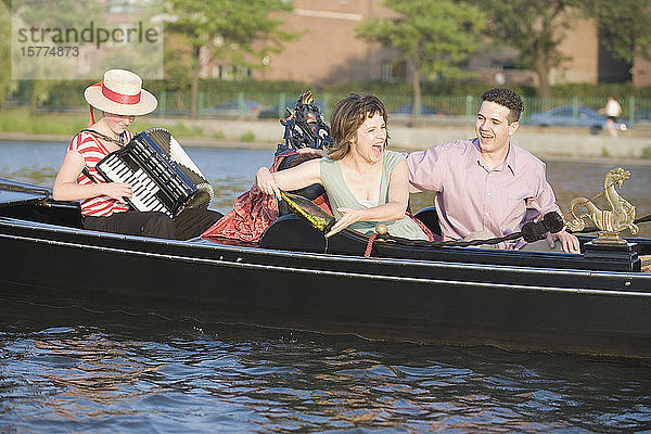 Mid adult couple travelling in a gondola