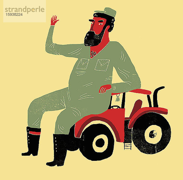 Landwirt winkend auf kleinem Traktor sitzend