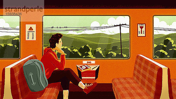 Mann mit Rucksack schaut aus dem Zugfenster