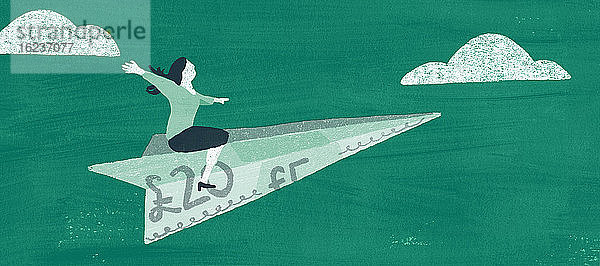 Frau fliegt auf Pfund-Banknote Papierflugzeug