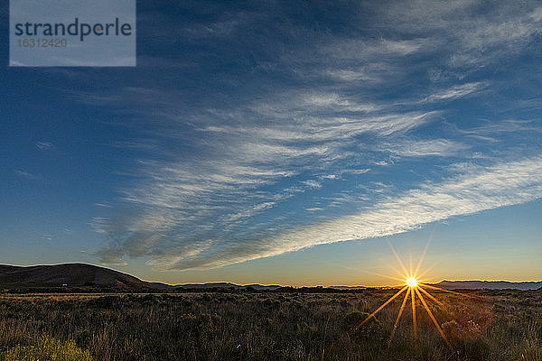 USA  Idaho  Sun Valley  Wolken über den Feldern bei Sonnenuntergang