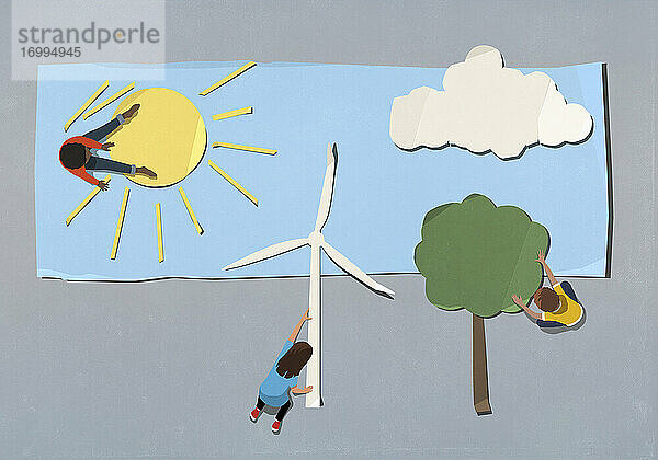 Kinder ordnen Umwelt- und Windradsymbole an