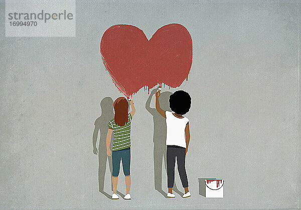 Multiethnische Mädchen malen rotes Herz an der Wand