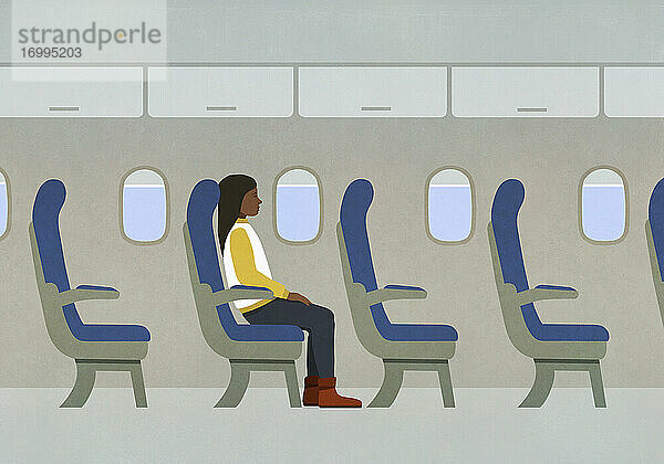 Frau reitet allein im Flugzeug