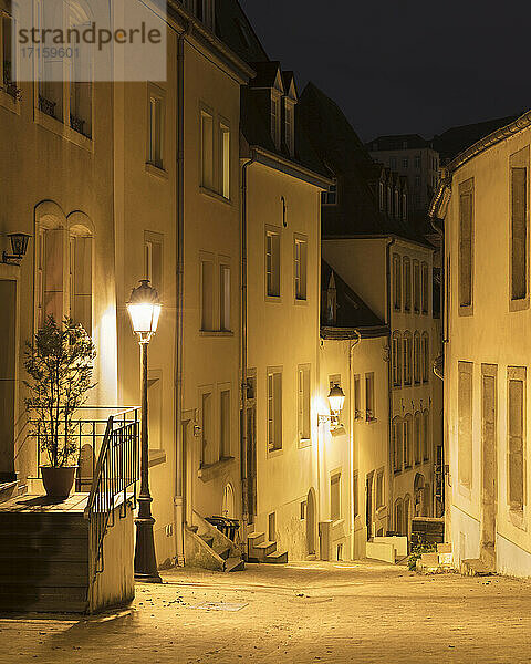 Street amidst building at night  Luxembourg City  Luxembourg
