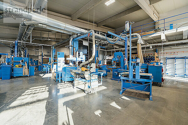 Manufacturing equipment in production hall at industry