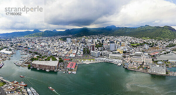 Landscape scenery of mountain range behind cityscape at Port Louis  Mauritius