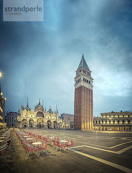 Italy  Veneto  Venice  Saint Marks Campanile standing on empty Piazza San Marco at dusk