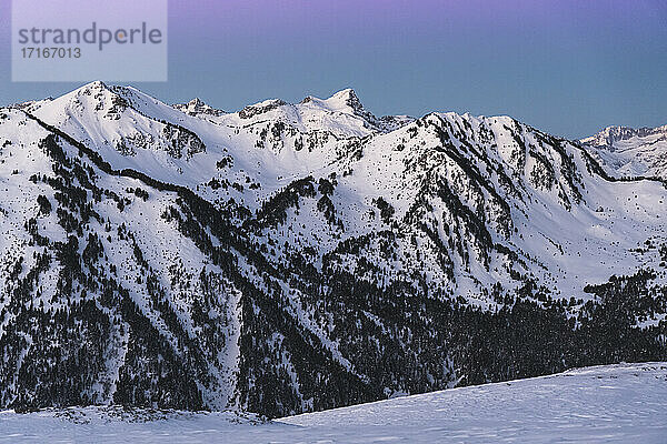 Pyrenees mountain covered in snow during sunrise