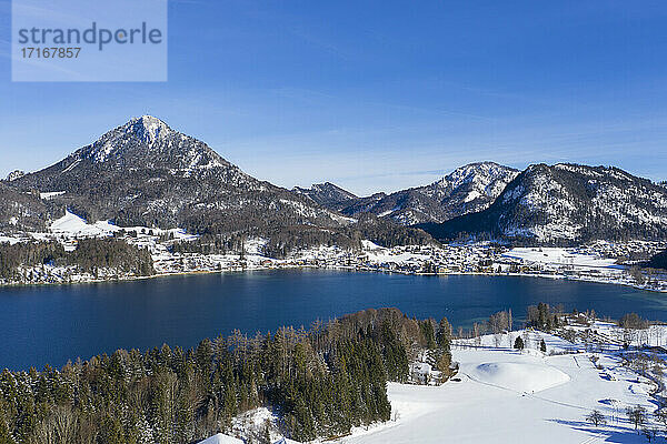 Drone view of Fuschlsee lake in winter
