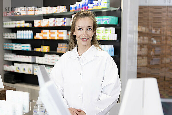 Female pharmacist at checkout