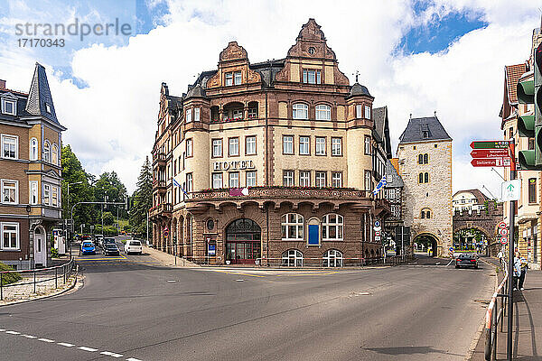 Historic hotel by station against cloudy sky at Bahnhof street and Karl Square in Eisenach  Germany