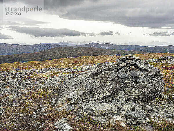 Rocks on land against mountains at Jamtaland  Sweden