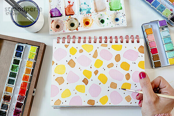 Painting colorful watercolor abstract terrazzo dots pattern