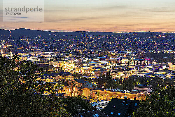 Germany  Baden-Wurttemberg  Stuttgart  Illuminated city center seen from top of Uhlandshohe hill at dusk