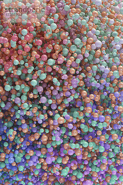 Dreidimensionales Rendering eines Haufens von pastellfarbenen Kugeln