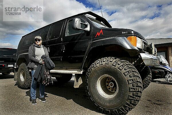 Super-size car  vehicle modified for highlands  woman  Gullfoss  Golden Circle  Iceland
