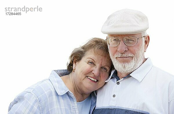 Glückliche Senior Paar vor einem weißen Hintergrund