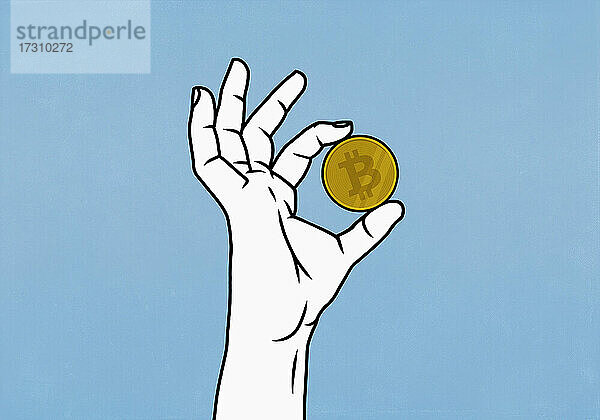 Close up Hand hält Bitcoin auf blauem Hintergrund