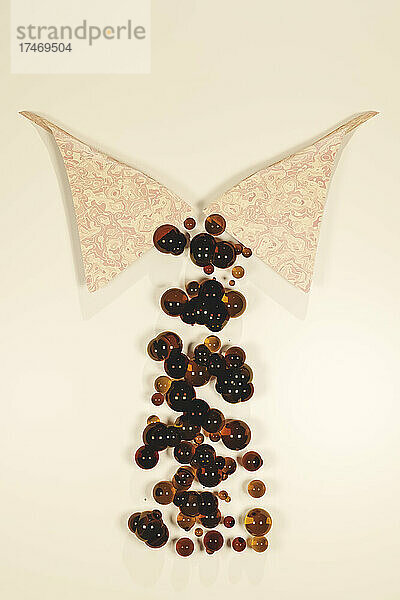 Three dimensional render of abstract necktie made of spheres