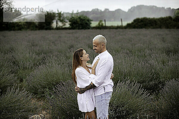 Happy couple on lavender field