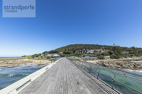 Australia  Victoria  Lorne  Clear blue sky over pier of coastal town on Louttit Bay