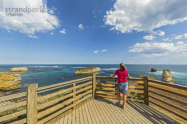 Australia  Victoria  Female tourist admiring Bay of Islands from observation deck