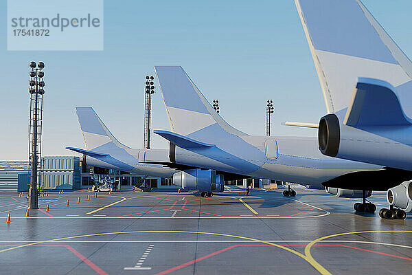 Dreidimensionale Darstellung von Leitwerken von Flugzeugen  die am Flughafen warten