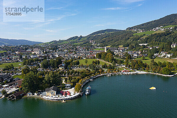 Austria  Upper Austria  Mondsee  Drone view of town on shore of Mondsee lake in summer