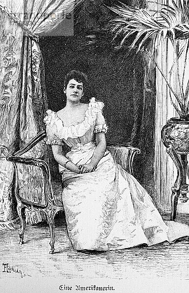 Porträt  Frau  von vorn  Wohnung  zufrieden  vornehm  Wohlstand  langes Kleid  Sofa  Vorhang  Palme  Blumentopf  New York  Amerika  historische Illustration von 1897