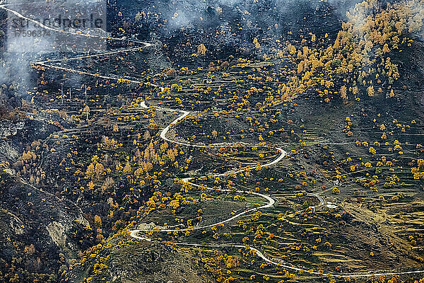 Russia  Dagestan  Gunib  Winding mountain road in autumn
