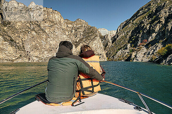 Couple traveling in boat at Chirkey reservoir  Sulak canyon  Dagestan  Russia