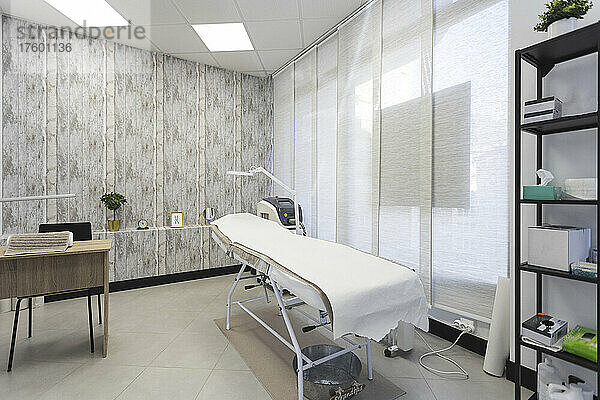 Empty skin care treatment room at aesthetic clinic