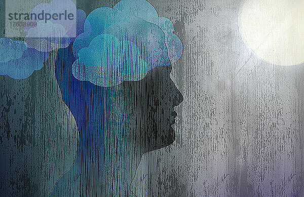 Depressiver Mann mit Kopf in Regenwolken