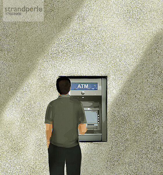 Mann an einem Geldautomaten