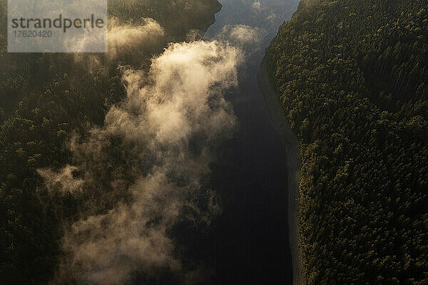 Aerial view of Bleiloch Reservoir at foggy autumn morning