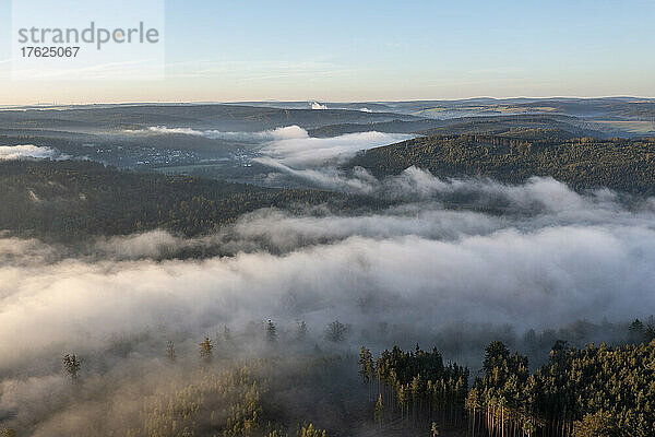 Aerial view of Bleiloch Reservoir shrouded in thick morning fog