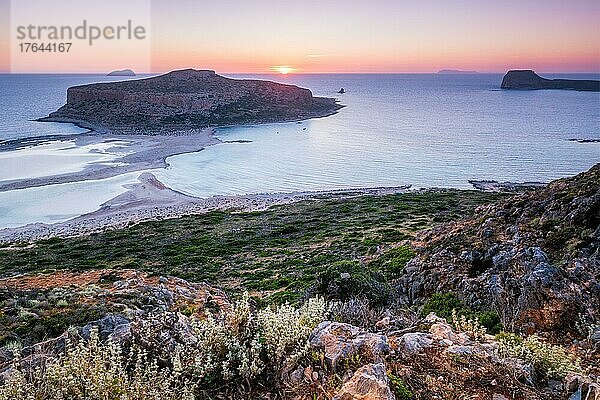 Island Gramvousa and the beautiful Balos beach on sunset in Crete island  Greece. Horizontal camera pan