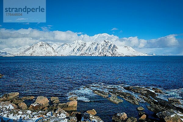 Lofoten islands and Norwegian sea in winter with snow covered mountains. Lofoten islands  Norway