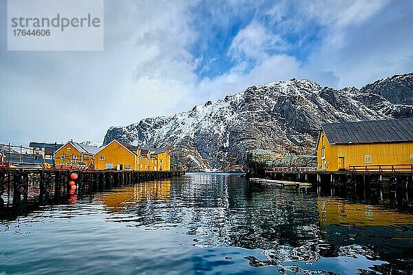Nusfjord authentic fishing village in winter with red rorbu houses. Lofoten islands  Norway