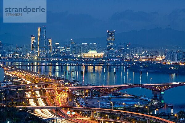 Aerial view of Seoul downtown cityscape and Seongsan bridge over Han River in twilight. Seoul  South Korea