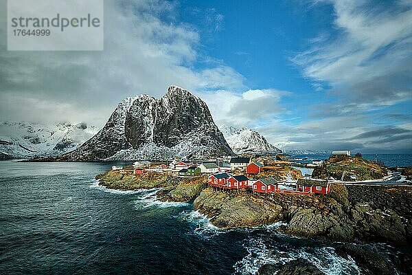 Hamnoy fishing village with red rorbu houses in Norwegian fjord in winter. Lofoten Islands  Norway
