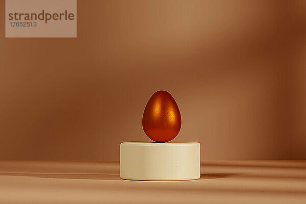 Three dimensional render of metallic egg on pedestal
