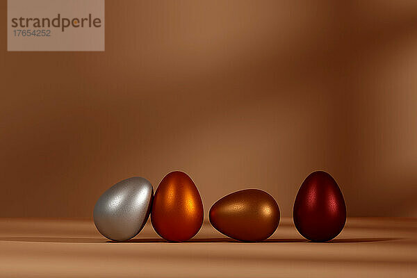 Three dimensional render of row of metallic eggs