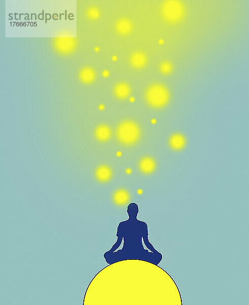 Helle Lichter über einem meditierenden Mann