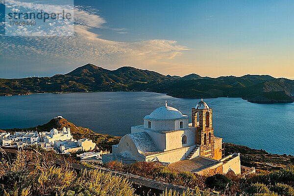 Traditional whitewashed Greek Orthodox church in Plaka village on Milos island on sunset. Milos island  Greece
