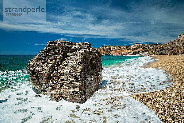 Rocks on Paleochori beach and waves of Aegean sea  Milos island  Cyclades  Greece. Slow motion