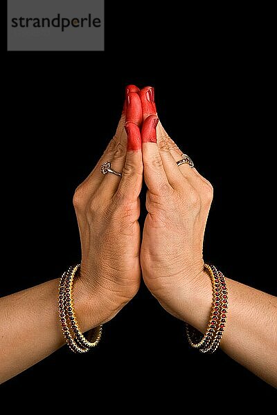 Woman hands showing Kapota hasta of indian classic dance Bharata Natyam